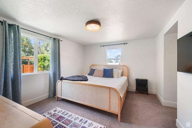 2500 E Simpson Ave S, Salt Lake City, UT 84109 - bedroom featuring a textured ceiling and carpet flooring