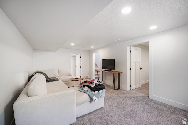 2500 E Simpson Ave S, Salt Lake City, UT 84109 - carpeted living room featuring recessed lighting and a textured ceiling