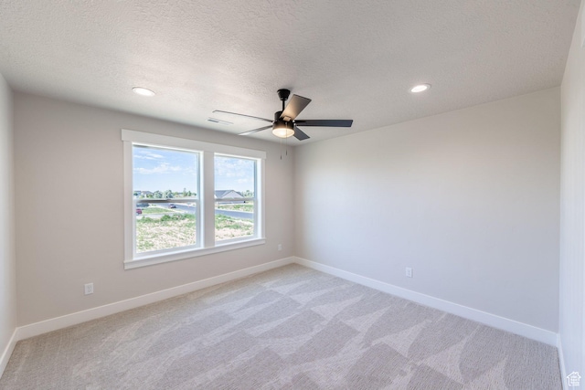 2864 N 3475 W, Plain City, UT 84404 - empty room featuring light carpet, ceiling fan, recessed lighting, and a textured ceiling