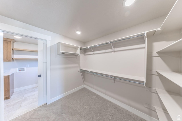 2864 N 3475 W, Plain City, UT 84404 - walk in closet featuring light colored carpet