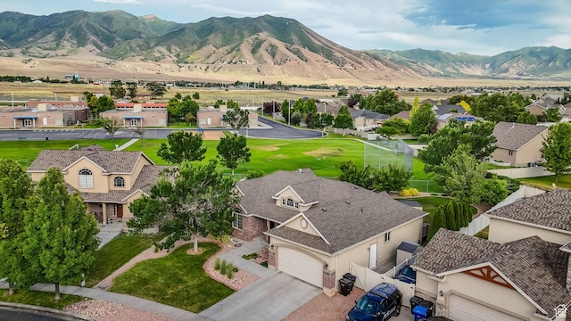 356 Warley Way, Stansbury Park, UT 84074 - aerial view of residential area featuring a mountain backdrop