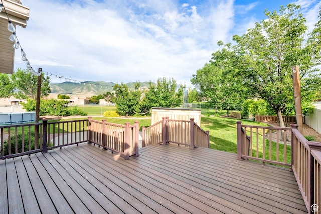 356 Warley Way, Stansbury Park, UT 84074 - deck featuring a mountain view and a fenced backyard