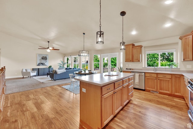 356 Warley Way, Stansbury Park, UT 84074 - kitchen with appliances with stainless steel finishes, light wood-style floors, open floor plan, light countertops, and recessed lighting