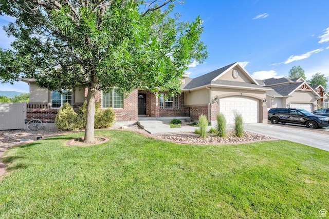 356 Warley Way, Stansbury Park, UT 84074 - view of front of house featuring brick siding, a garage, a front yard, and concrete driveway