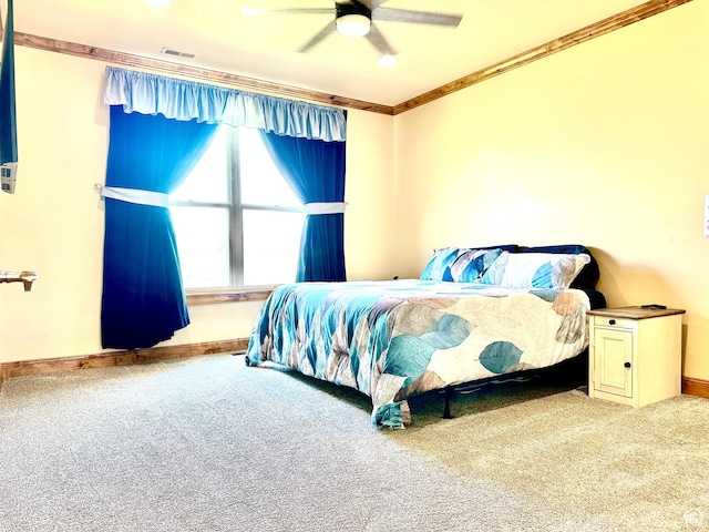 620 S Michael St, Vernal, UT 84078 - carpeted bedroom with crown molding and ceiling fan