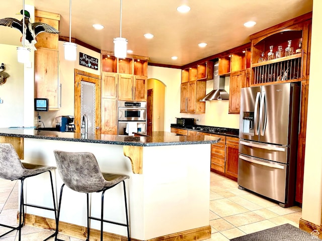 620 S Michael St, Vernal, UT 84078 - kitchen featuring stainless steel appliances, wall chimney exhaust hood, a peninsula, light tile patterned floors, and recessed lighting
