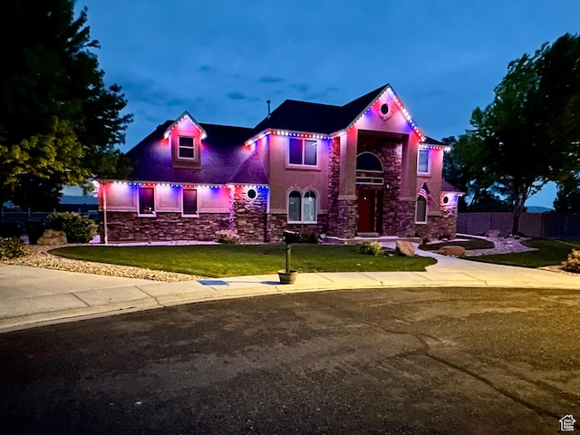 620 S Michael St, Vernal, UT 84078 - view of front of property with stone siding, a front lawn, and stucco siding