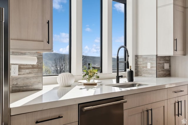 8960 Parleys Ln, Park City, UT 84098 - kitchen with appliances with stainless steel finishes, backsplash, light countertops, and a mountain view