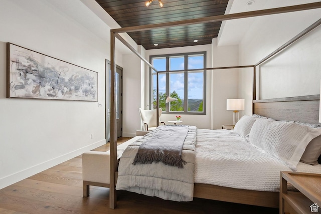 8960 Parleys Ln, Park City, UT 84098 - bedroom with wood finished floors and wooden ceiling