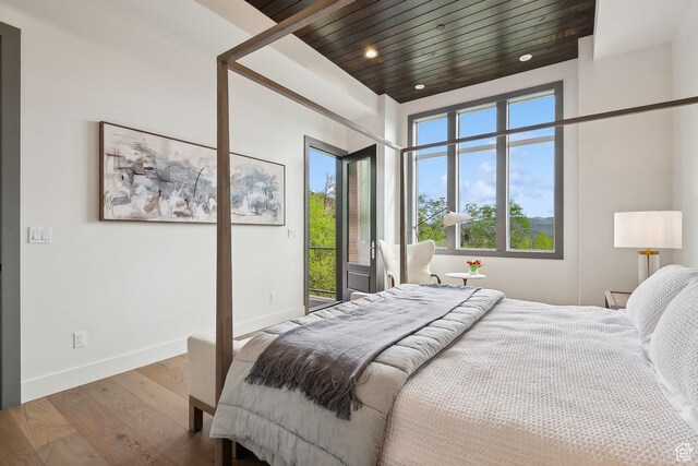 8960 Parleys Ln, Park City, UT 84098 - bedroom featuring wood finished floors, access to outside, and recessed lighting