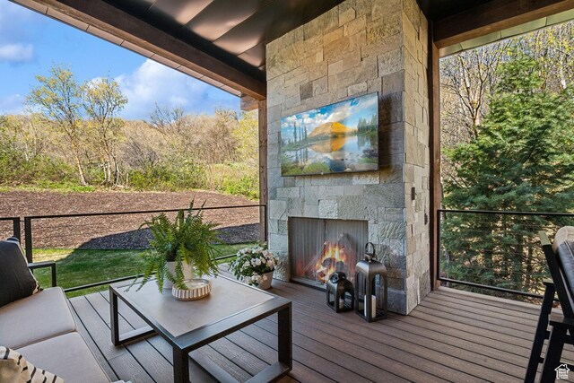 8960 Parleys Ln, Park City, UT 84098 - deck with an outdoor stone fireplace