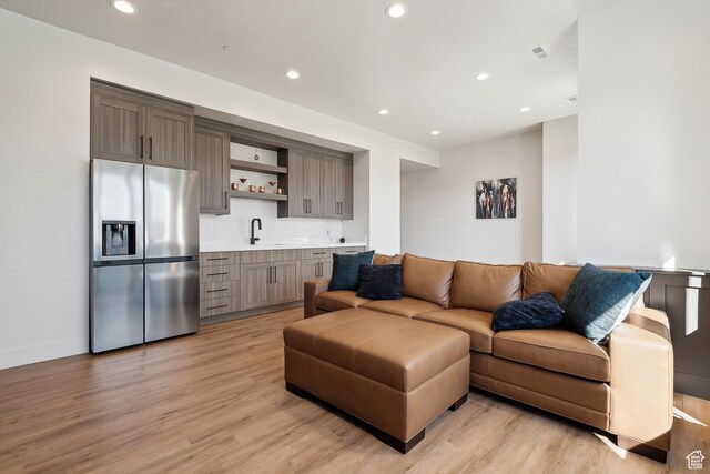 8960 Parleys Ln, Park City, UT 84098 - living area featuring wet bar, light wood-style floors, and recessed lighting