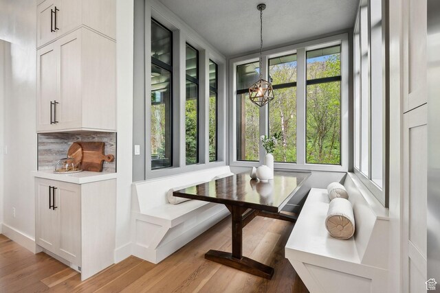8960 Parleys Ln, Park City, UT 84098 - dining room featuring light wood finished floors, a chandelier, and breakfast area
