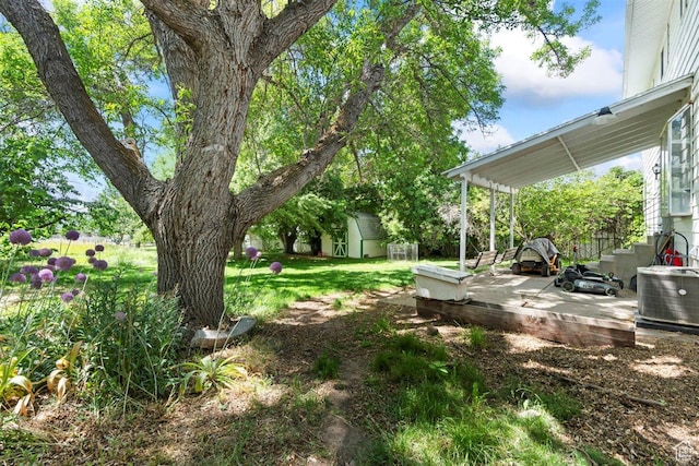 220 S Coleman St W, Tooele, UT 84074 - view of green lawn with an outbuilding