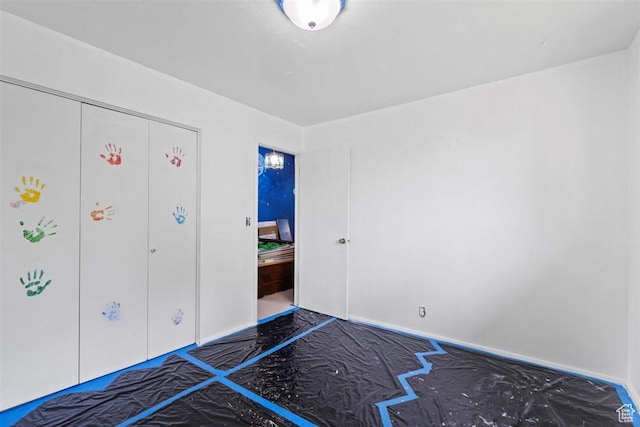 220 S Coleman St W, Tooele, UT 84074 - unfurnished bedroom with baseboards and a closet