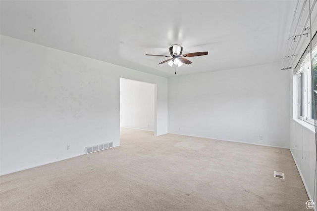 220 S Coleman St W, Tooele, UT 84074 - empty room with ceiling fan and light colored carpet