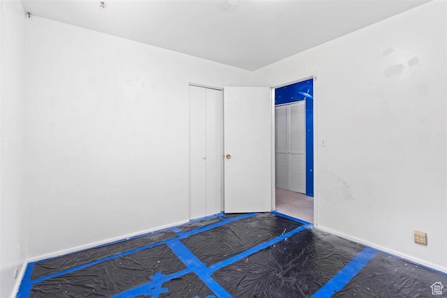 220 S Coleman St W, Tooele, UT 84074 - unfurnished bedroom with baseboards and a closet