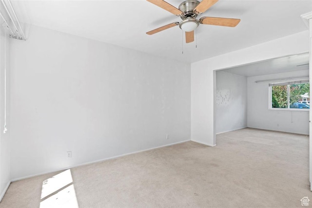 220 S Coleman St W, Tooele, UT 84074 - empty room featuring light carpet and a ceiling fan