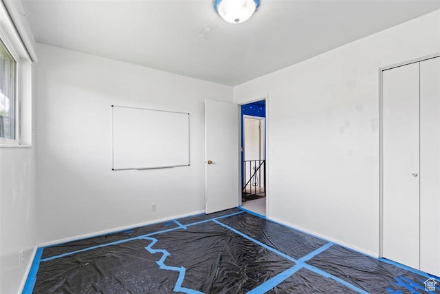 220 S Coleman St W, Tooele, UT 84074 - unfurnished bedroom featuring baseboards