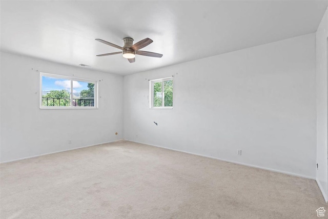220 S Coleman St W, Tooele, UT 84074 - empty room with a ceiling fan and light carpet