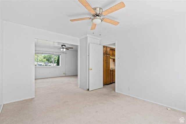 220 S Coleman St W, Tooele, UT 84074 - empty room with light carpet and ceiling fan