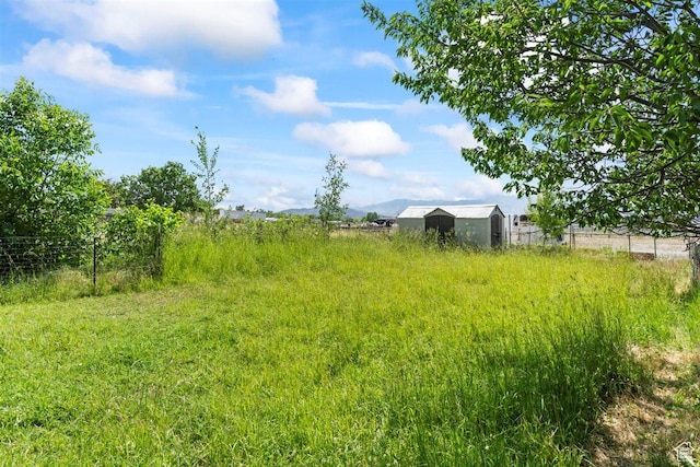 220 S Coleman St W, Tooele, UT 84074 - view of yard featuring an outbuilding