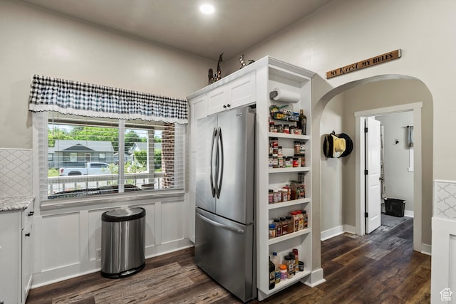 3530 Madison Ave, Ogden, UT 84403 - kitchen featuring freestanding refrigerator, white cabinetry, dark wood finished floors, and light stone countertops