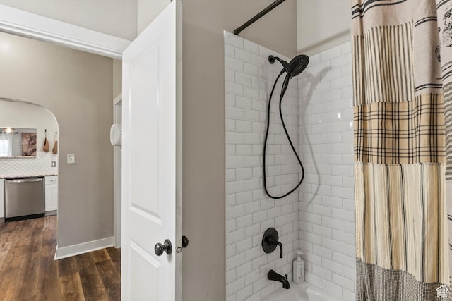 3530 Madison Ave, Ogden, UT 84403 - bathroom with shower / bath combo with shower curtain, wood finished floors, and backsplash
