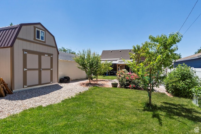 3530 Madison Ave, Ogden, UT 84403 - view of green lawn featuring a storage shed