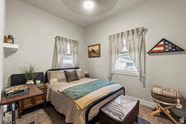 3530 Madison Ave, Ogden, UT 84403 - carpeted bedroom featuring multiple windows and vaulted ceiling