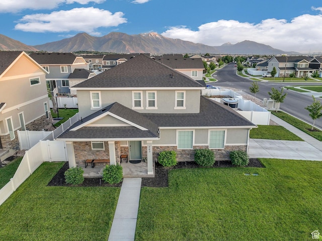 743 W 950 S, Springville, UT 84663 - view of front of property with stone siding, stucco siding, a mountain view, and a shingled roof