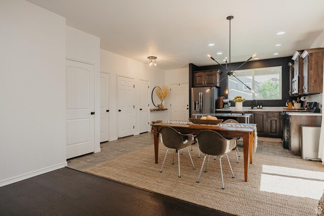 480 Firestone Dr, Santaquin, UT 84655 - dining room featuring recessed lighting, a chandelier, and light wood-style floors