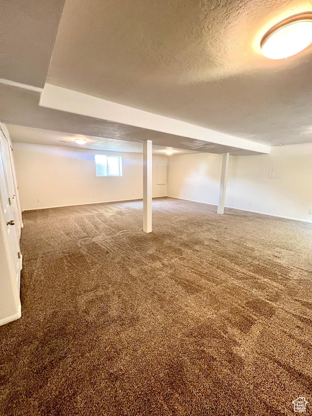 90 W 640 N, Richfield, UT 84701 - basement featuring carpet and a textured ceiling