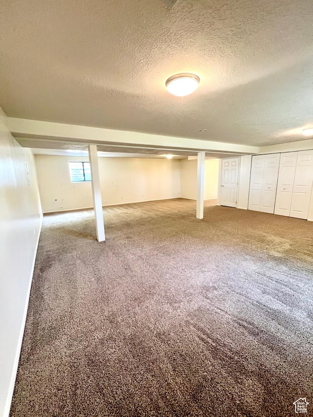 90 W 640 N, Richfield, UT 84701 - below grade area with a textured ceiling and carpet