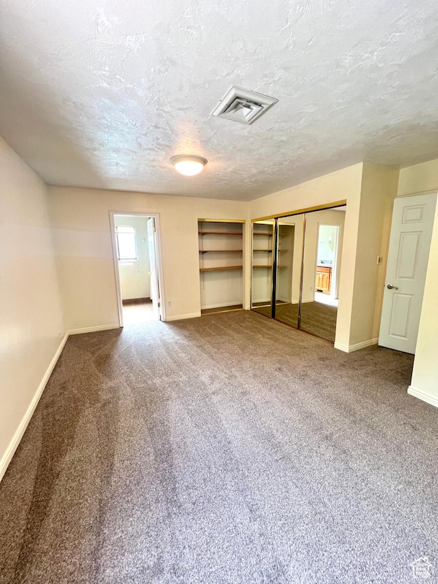 90 W 640 N, Richfield, UT 84701 - unfurnished living room with a textured ceiling and carpet