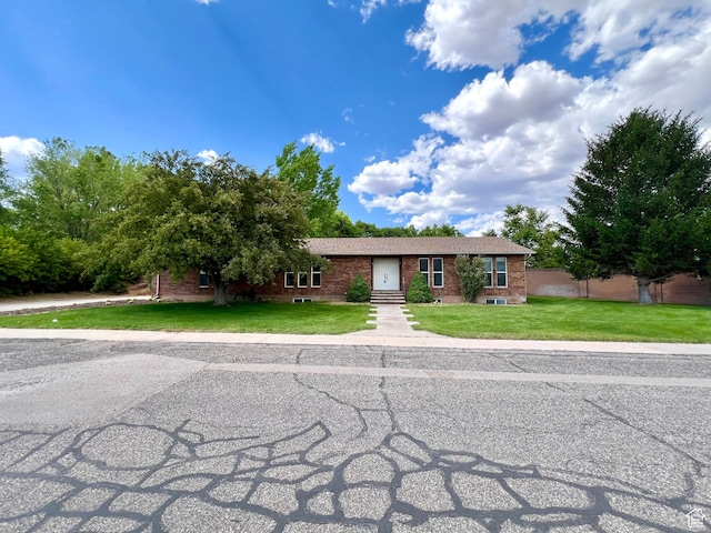 90 W 640 N, Richfield, UT 84701 - single story home featuring brick siding and a front yard