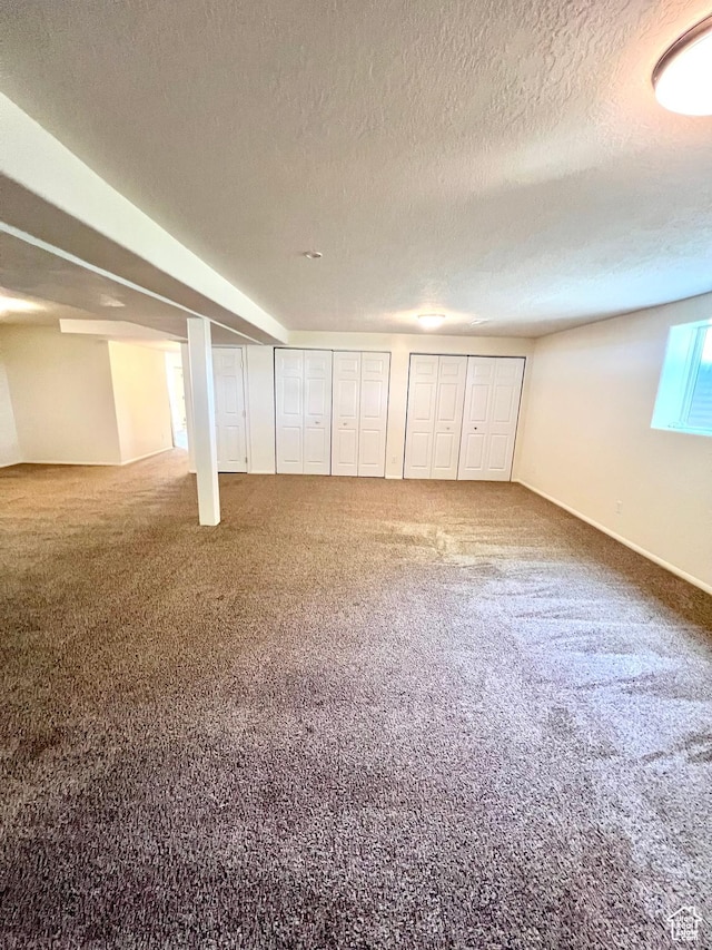 90 W 640 N, Richfield, UT 84701 - below grade area featuring a textured ceiling and carpet floors