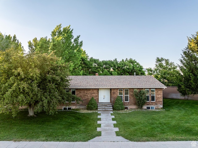90 W 640 N, Richfield, UT 84701 - single story home featuring a front lawn, brick siding, and roof with shingles