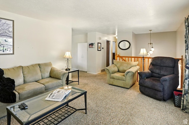 167 E 950 S, Layton, UT 84041 - carpeted living room featuring a chandelier and a textured ceiling