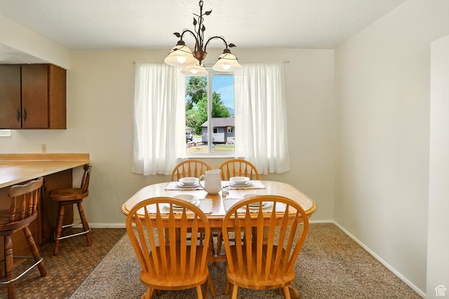 167 E 950 S, Layton, UT 84041 - dining area with a chandelier and dark carpet