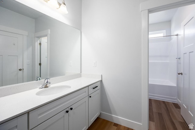 1454 N 3830 W Unit 303, Lehi, UT 84043 - full bath featuring vanity, wood finished floors, and shower / bathtub combination