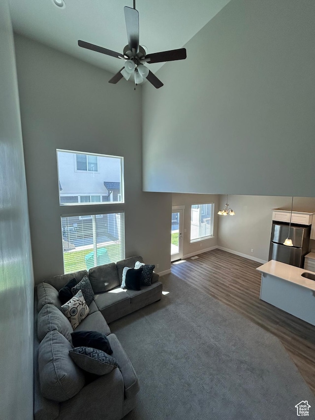 269 W 700 N, Vineyard, UT 84059 - living area featuring a high ceiling, ceiling fan, and wood finished floors