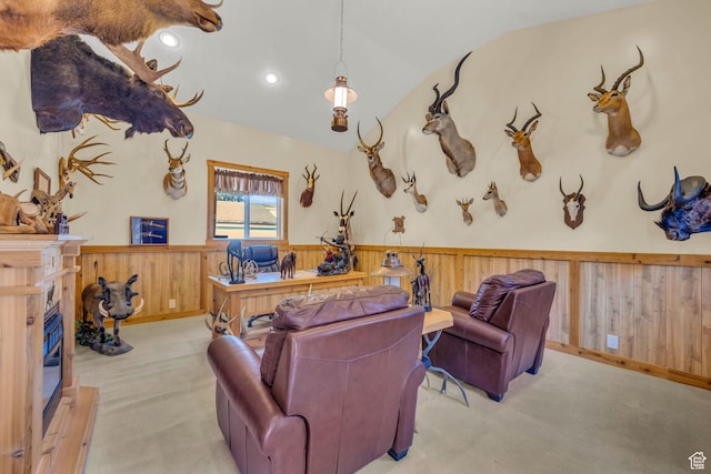 315 E Oak Ln, Kaysville, UT 84037 - carpeted living area with a wainscoted wall, vaulted ceiling, a high end fireplace, wood walls, and recessed lighting