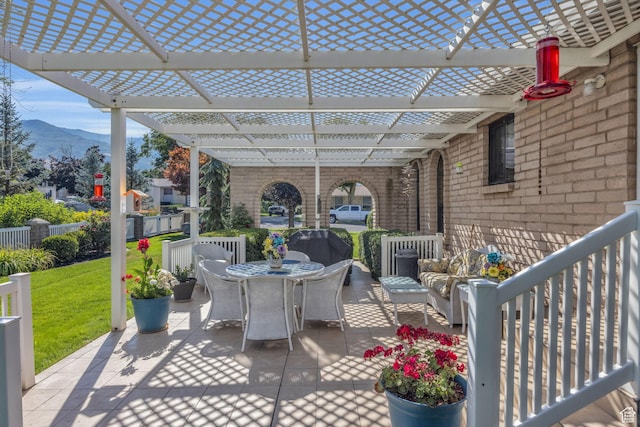 315 E Oak Ln, Kaysville, UT 84037 - view of patio / terrace featuring outdoor dining area, a pergola, and a mountain view