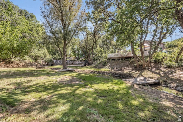 315 E Oak Ln, Kaysville, UT 84037 - view of grassy yard with a wooden deck
