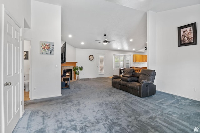 9353 S 4460 W, West Jordan, UT 84088 - carpeted living room featuring a tiled fireplace, a ceiling fan, and recessed lighting