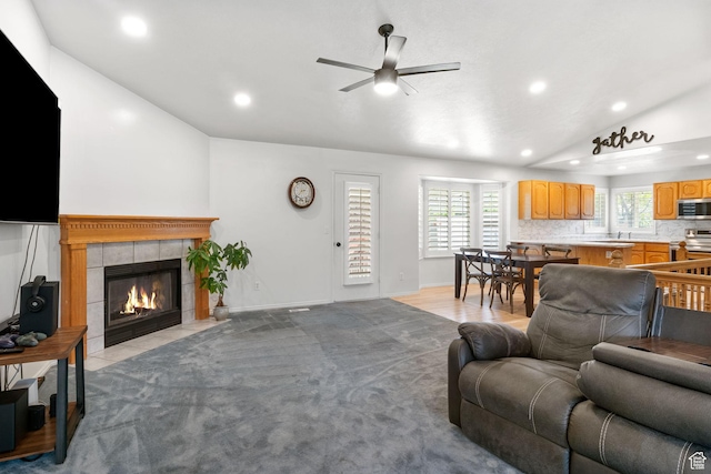 9353 S 4460 W, West Jordan, UT 84088 - living area with vaulted ceiling, recessed lighting, ceiling fan, and a fireplace