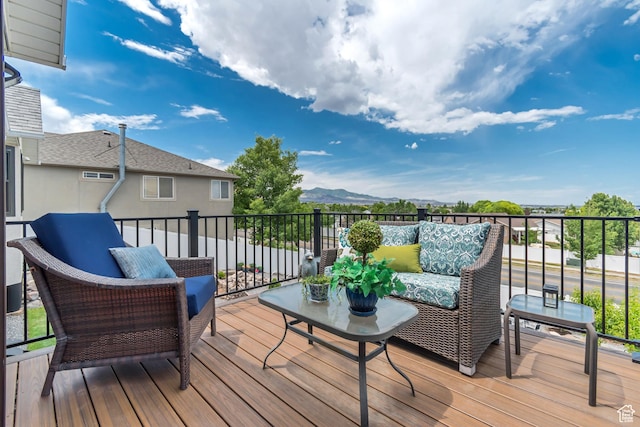 5718 W Silver Rose Cir S, Herriman, UT 84096 - wooden terrace featuring a mountain view and an outdoor living space