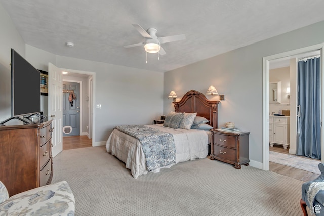 5718 W Silver Rose Cir S, Herriman, UT 84096 - bedroom featuring light carpet, a ceiling fan, and ensuite bathroom