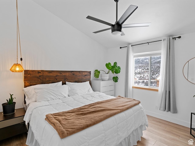 8375 E Lake Pines Dr Unit 212, Heber City, UT 84032 - bedroom with light wood finished floors, lofted ceiling, and a ceiling fan